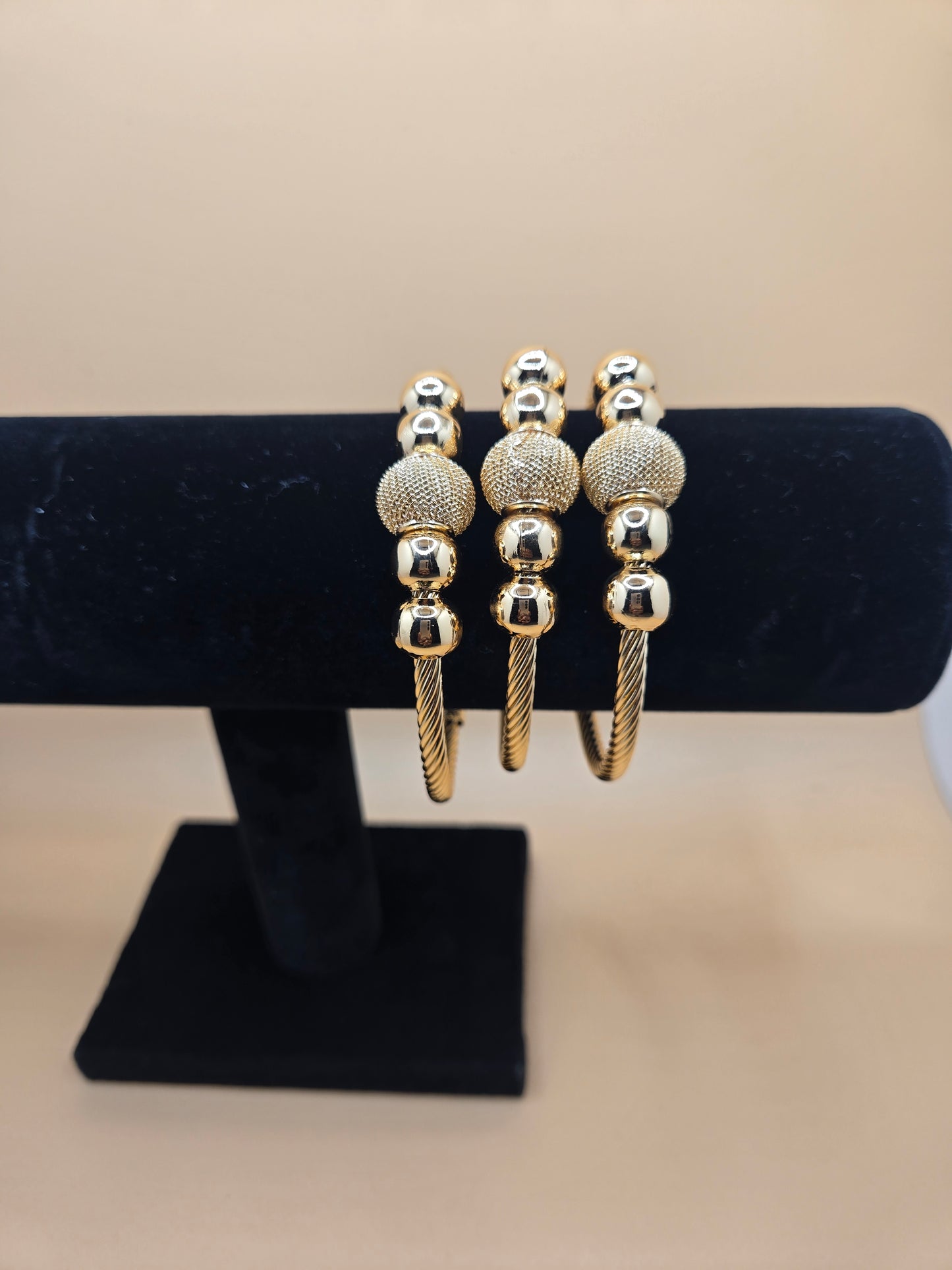 Elegant Gold-Tone Mesh Ball Bangles
