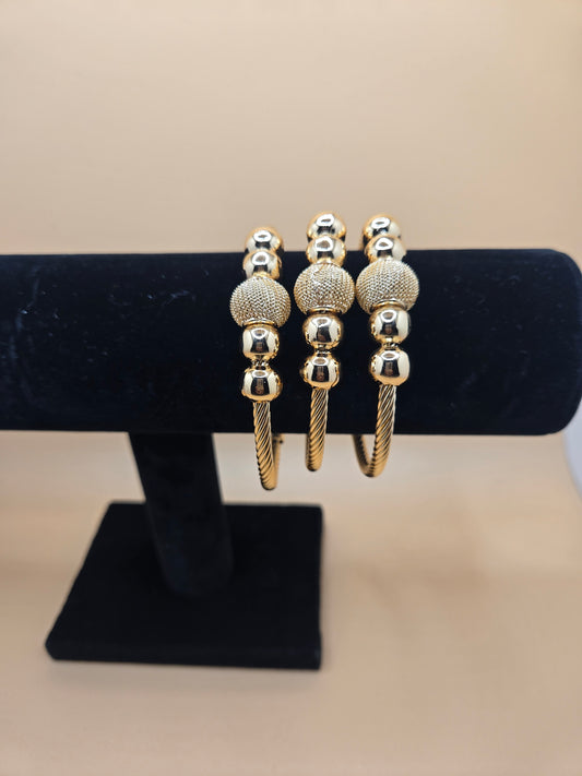 Elegant Gold-Tone Mesh Ball Bangles