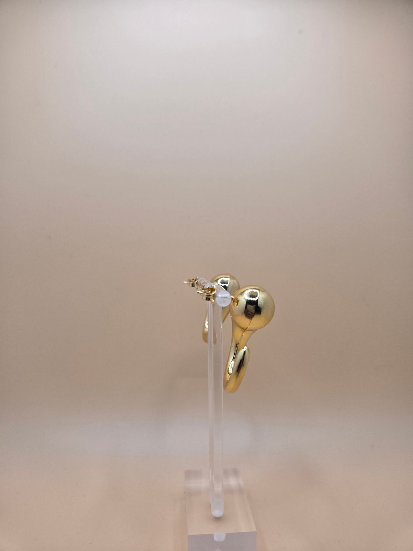 Modern Sculptural Gold Hoop Earrings – Teardrop Swirl Design