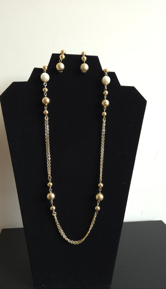Matching set of earrings and long chain