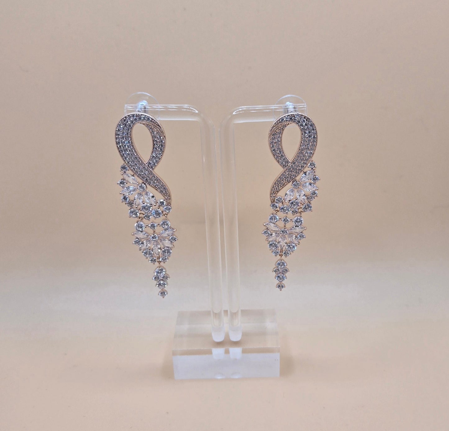 Luxury Silver Infinity Crystal Drop Earrings – Elegant Bridal & Evening Jewelry